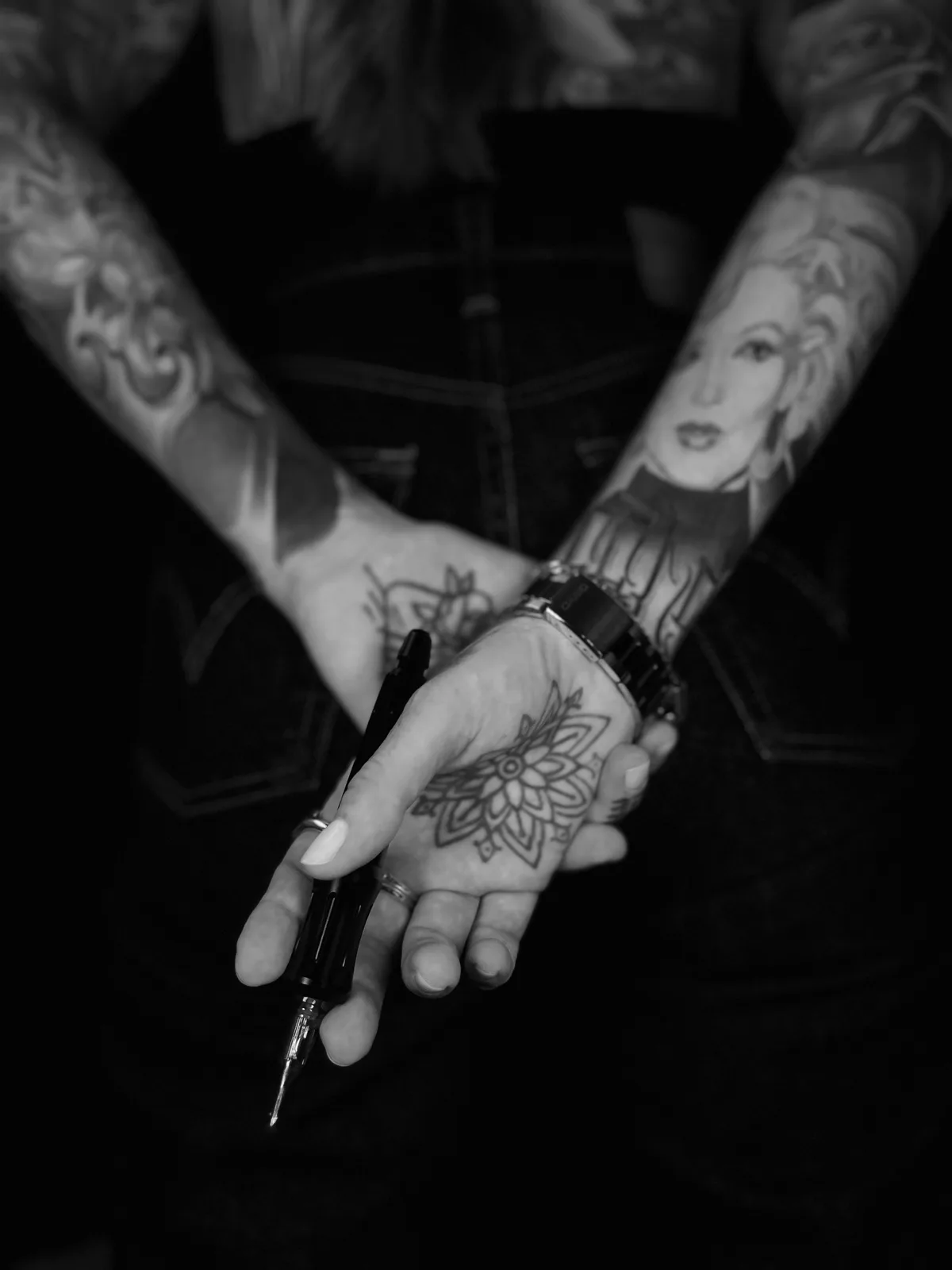 Hand-poking in progress in the private studio
